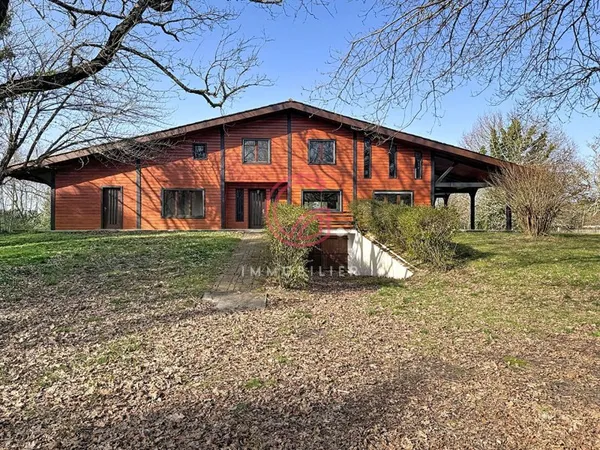 Maison d'architecte à vendre à Sainte Eulalie en Born - 8 pièces, 255 m² sur terrain de 24 634 m²