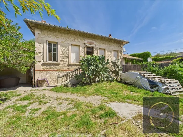 Maison avec terrain constructible et appartement independant