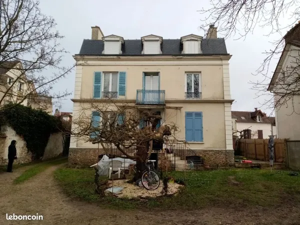 Appartement avec cave, stationnement et jardin