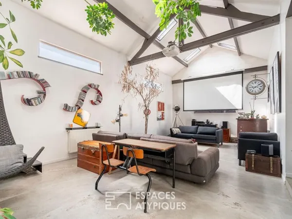 Maison d'architecte à l'esprit loft avec jardin