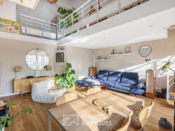 Double hauteur et terrasses en dernier étage à deux pas du Rhône