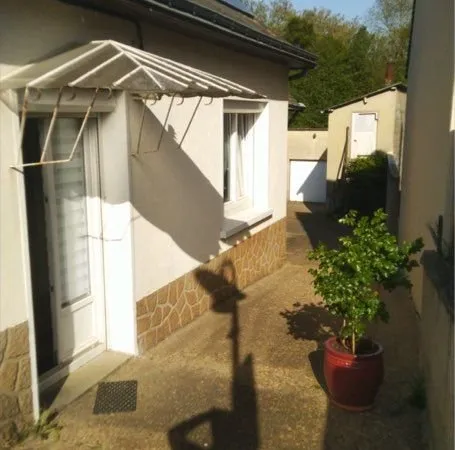 Maison avec jardin terrain et garage