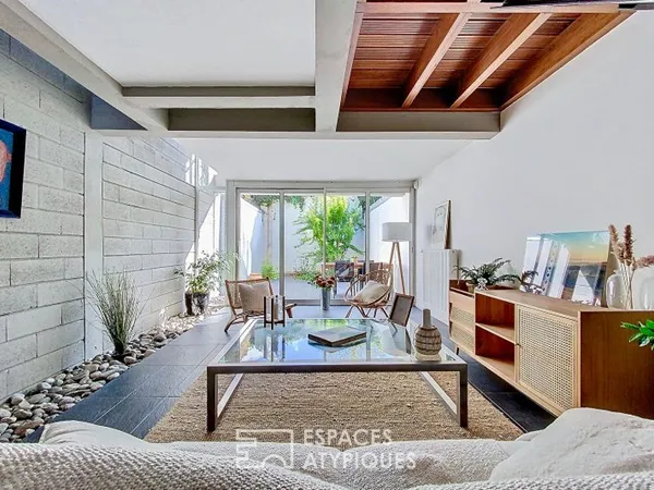 Loft industriel avec terrasse végétalisée