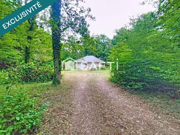 Maison avec studio indépendant sur terrain boisé