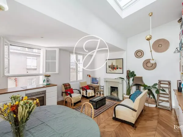 Paris 18e - ABBESSES - Appartement à vendre - 3 pièces - 46.97m² Carrez - 52.29m² au sol - 2 chambre