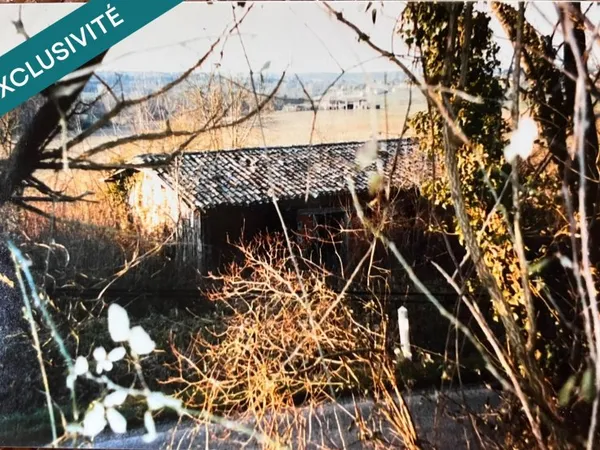 terrain constructible atypique proche de la Nature de 2097 m2 dont 495 m2 constructible