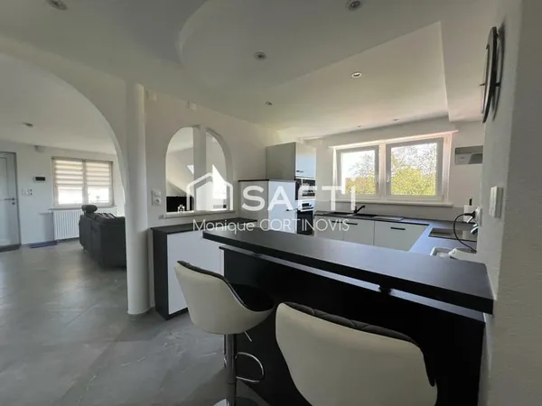 Location appartement de 67.85m² avec place de parking et jardin
