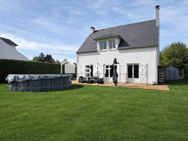 Maison individuelle dans un cadre verdoyant