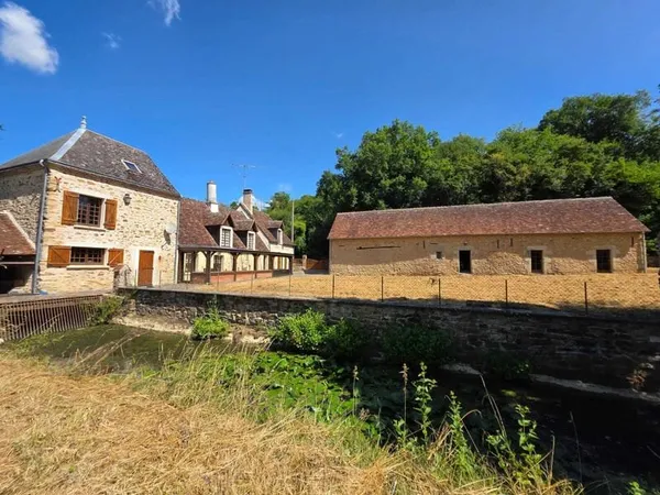 Ancien moulin de 253m2 avec son brief en eau et 2ha49a79ca de terrain