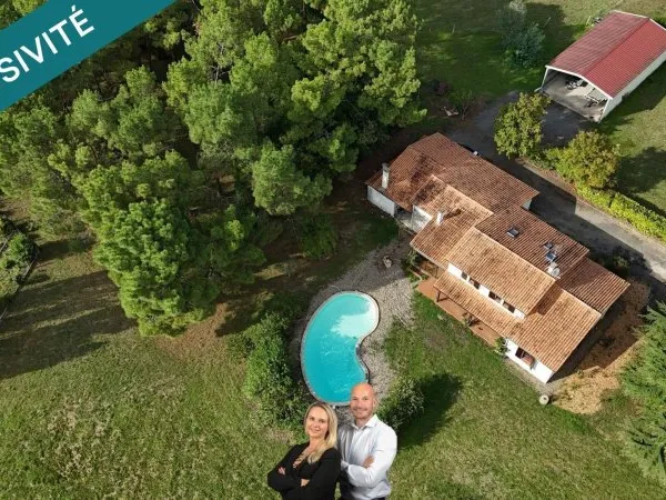 Maison avec grand terrain au calme