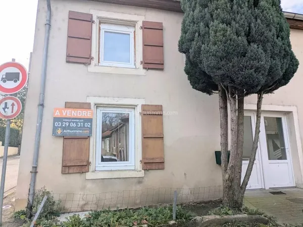 Maison de ville dans quartier agréable.