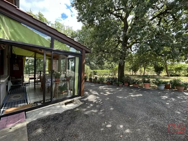 Maison T4 avec jardin, dépendances et garage