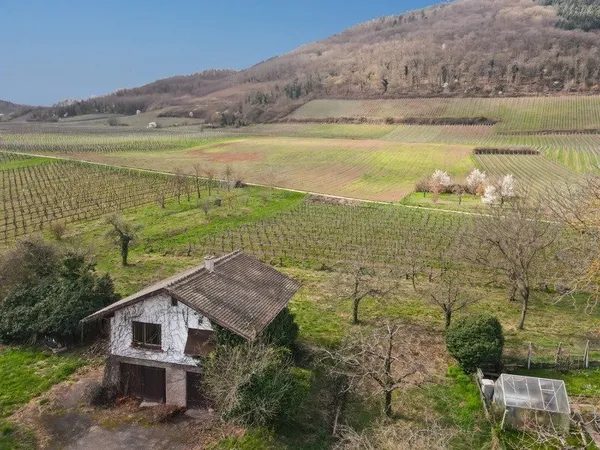 Maison à rénover avec terrain constructible