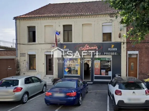 Immeuble comprenant un café tabac et un logement