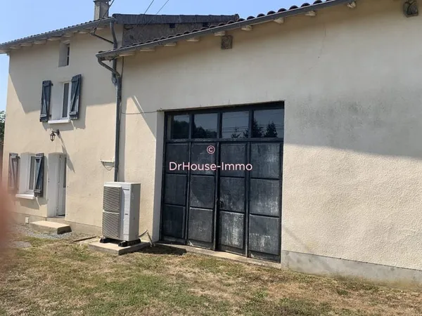 Charmante Maison Mitoyenne 4 Pièces avec Garage et Terrasse à Pageas