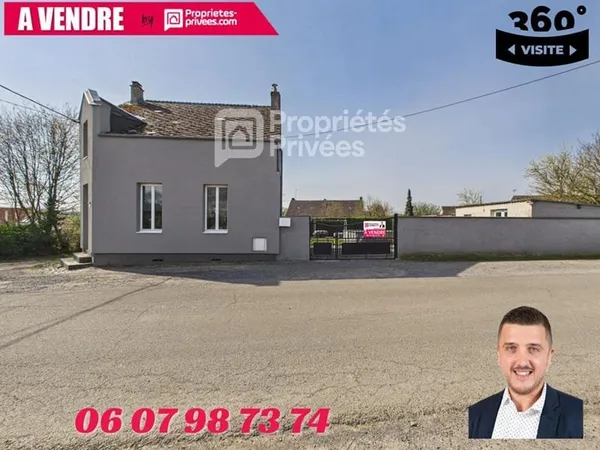 Grande maison avec terrain, garage et deux logements indépendants