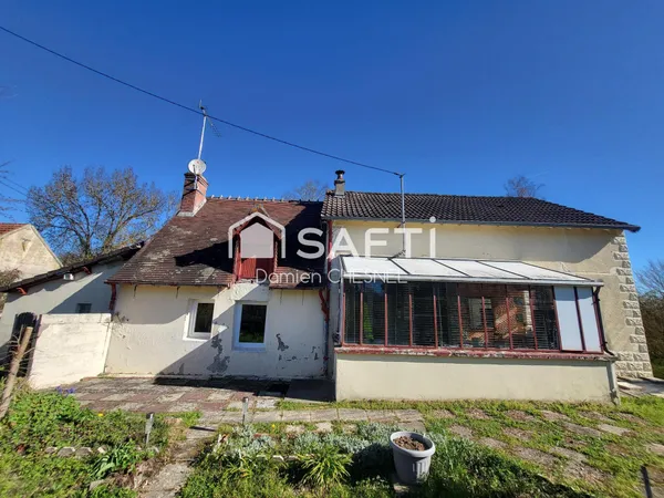 Maison avec vie de plain pied sur terrain arboré
