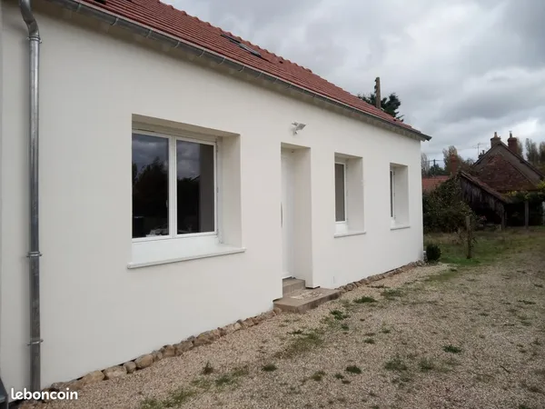 Logement au RdC d'une maison individuelle