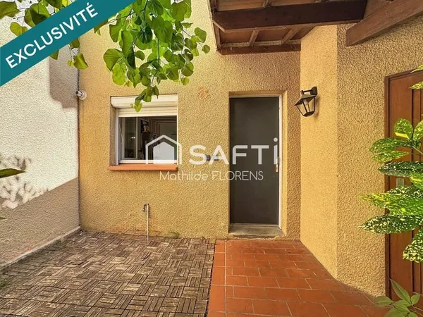 Maison T4 en triplex avec terrasse, jardinet et places de parking