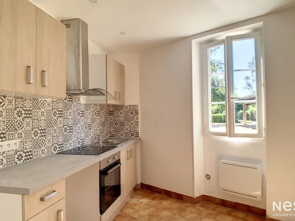 A Louer Appartement de type T3 de 65 m² avec cour commune et place de parking à Condom