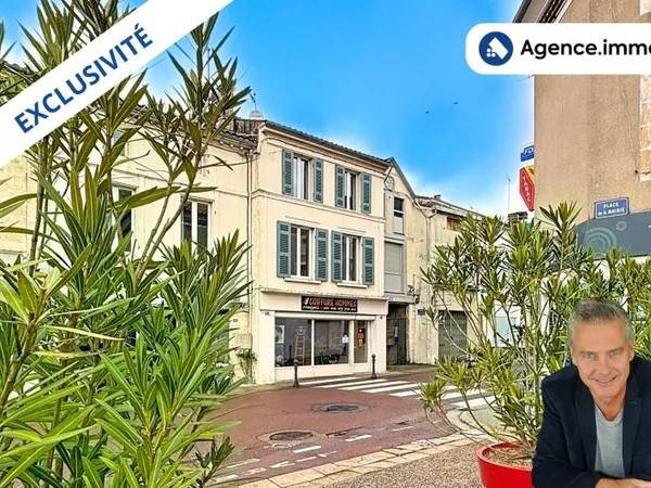 Immeuble de rapport appt+ local commercial loué