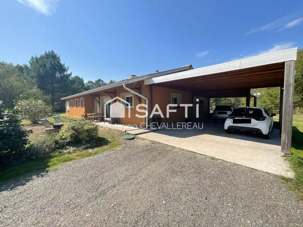 Sur parcelle de 2,5ha, maison avec garage attenant, carport et hangar séparé