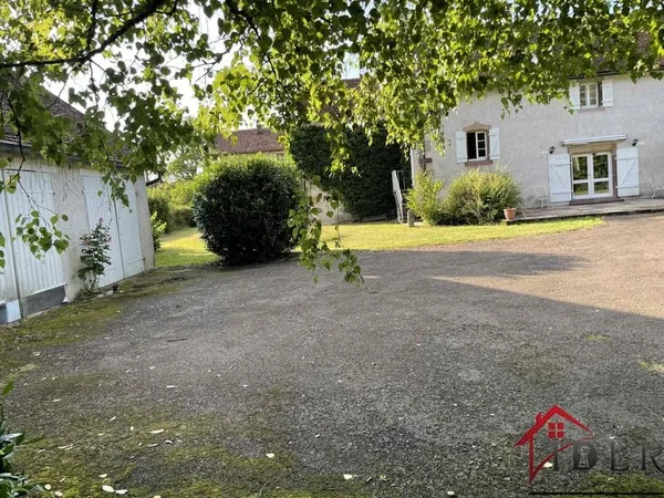 Une maison de caractère aux volumes généreux sur le secteur
