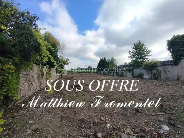 Terrain en second rang vue sur champs de 747 m²