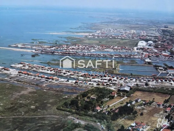 Vue exceptionnelle sur le Bassin d'Arcachon Possibilité d'acquéreur la parcelle voisine avec une arc