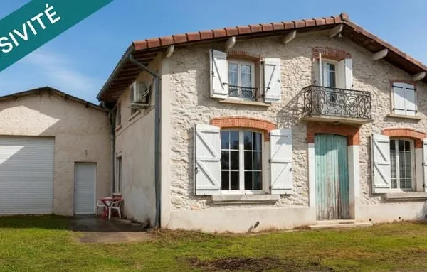 Maison de caractère avec grand hangar