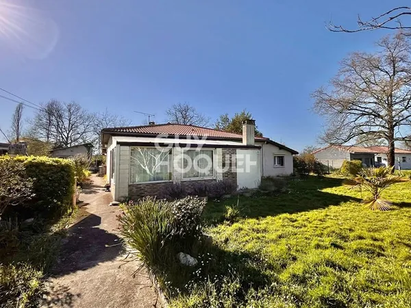 Maison de plain-pied de 115 m2, 4 chambres, un garage