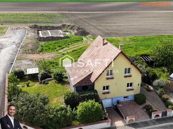 Jolie maison de 5 pièces disposant d'une véranda, d'un sous sol et d'un grand jardin de 5,83 ares !