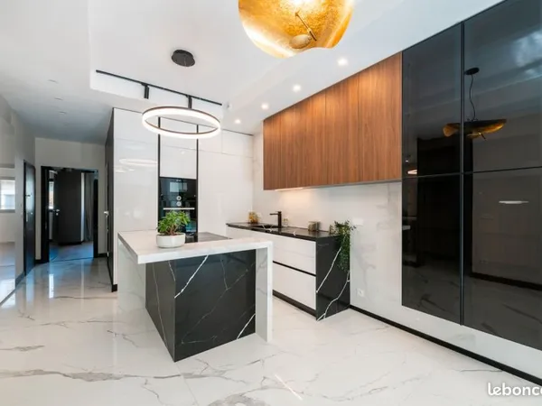 Duplex familial d'exception avec jardin privatif