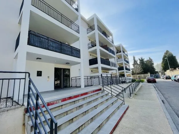 Appartement T4 RDJ avec jardin et place de stationnement