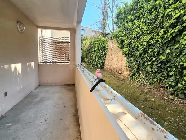 Triolet : appartement de type 2 avec terrasse et place de parking