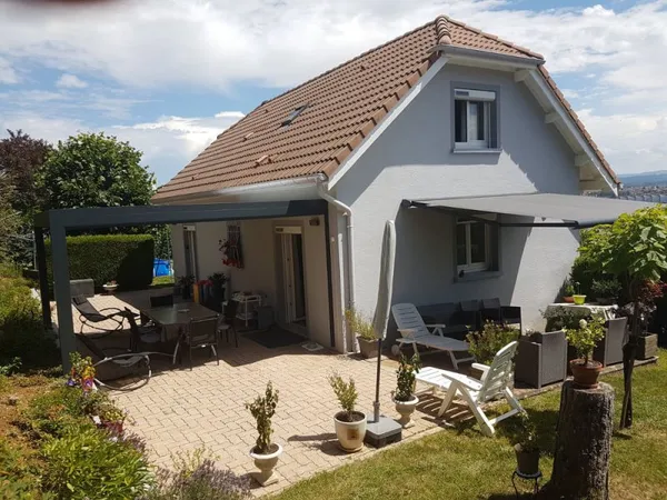 Girardi Immobilier vous présente sur les hauteurs de Sochaux cette charmante maison de 115 m2