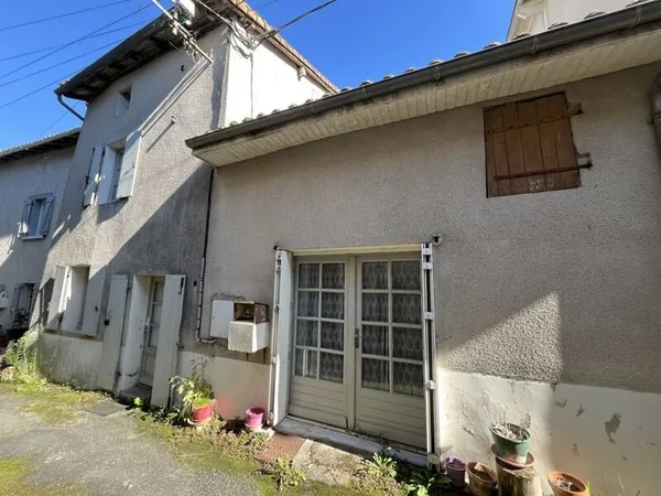 Maison de bourg de 4 pièces principales