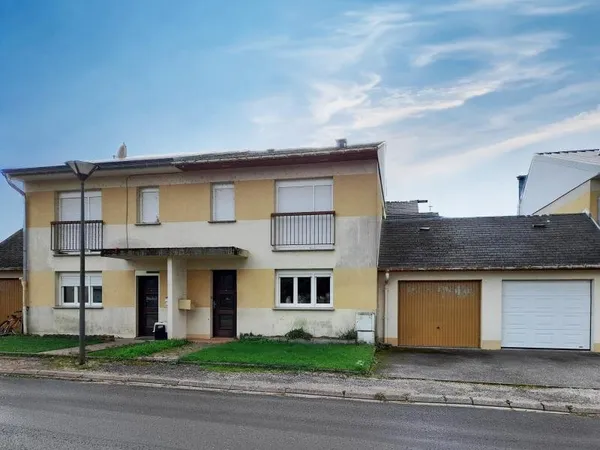 MAISON AVEC GARAGE ET JARDIN