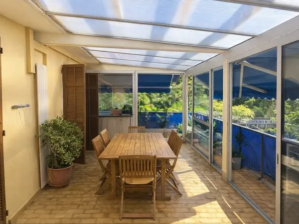 Appartement 4 pièces, terrasse fermée, cave et parking