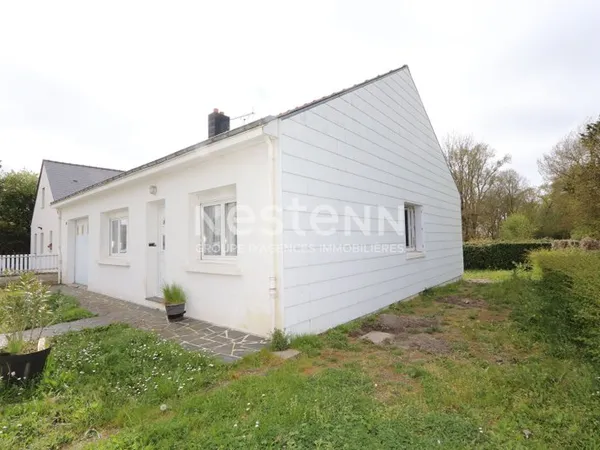 Maison de plain-pied de 88 m² habitables sur terrain de 1856 m² - Garage