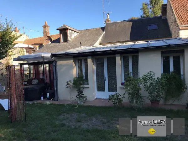 Maison de ville à vendre à Dourdan centre, 5 pièces 130 m² avec jardin et garage, charme de l'ancien