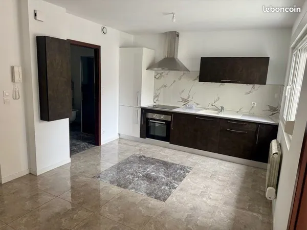 Appartement F2 de 70m2 terrasse,parking,cave