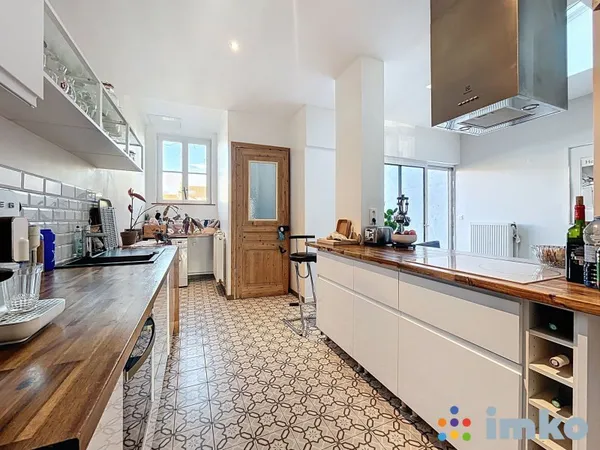 Maison de type 1930 entièrement rénovée avec jardin, garage