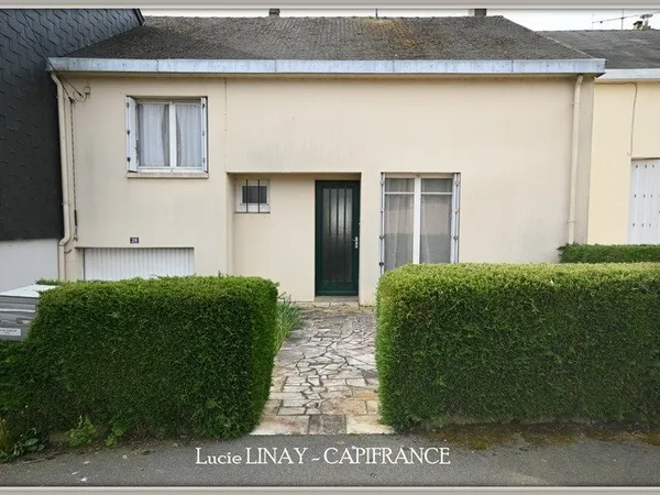 Maison à rénover dans quartier calme avec potentiel de développement