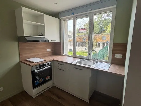 Appartement T3 avec garage et jardin