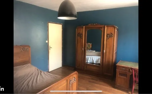 Grande chambre dans colocation avec jardin
