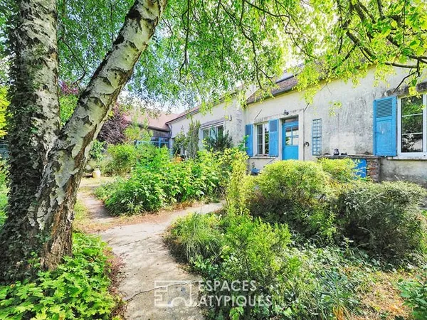 Maison de campagne rénovée avec son jardin bucolique