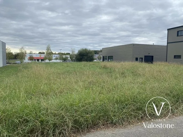 Terrain 2550 m2 en zone artisanale