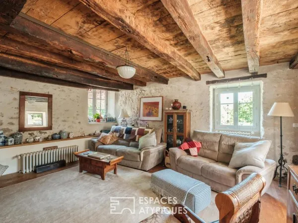 Maison au bord de l'eau, avec son moulin et ses dépendances
