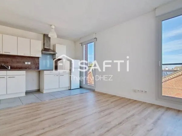 Tourcoing proximité Mouvaux, T2 lumineux de 49m² avec balcon et place de parking en sous-sol